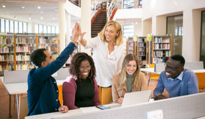 Teacher working to build collaboration between this group for better teamwork