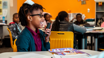 Diverse students using the Lightspeed Activate system with Pods for small group learning