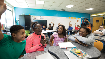 Diverse Students using the Lightspeed Activate system with pods for small group learning