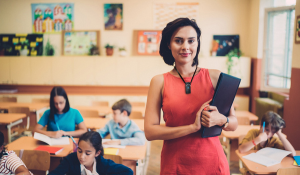 Teacher k-12 using assistive technology including Lightspeed FMN Flexmike